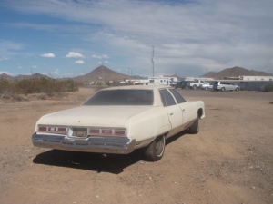 A beat-up version of the 1975 Chevy Impala my uncle Mckinley bought in August 1975, August 15, 2015. (http://www.dvap.com).
